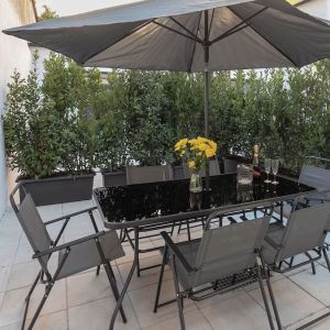 Outdoor terrace at Aiello Hotels - CityLife Apartments.