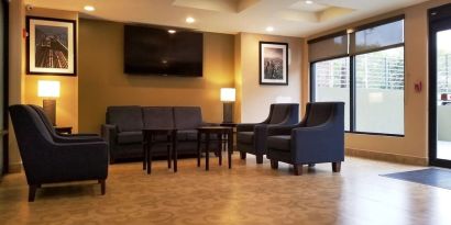 Lobby lounge area at Days Inn By Wyndham Brooklyn Marine Park.
