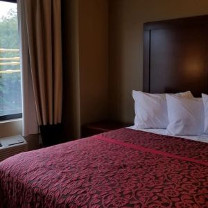 Day use room with large window and private bathroom at Days Inn By Wyndham Brooklyn Marine Park.