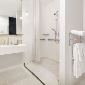 Private guest bathroom with shower at Nu Hotel - Brooklyn.
