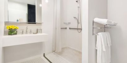 Private guest bathroom with shower at Nu Hotel - Brooklyn.