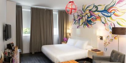 King bed with workspace and private bathroom at Nu Hotel - Brooklyn.