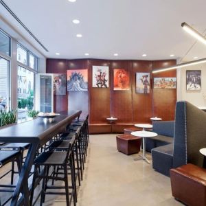 Lobby lounge area and workspace at Nu Hotel - Brooklyn.