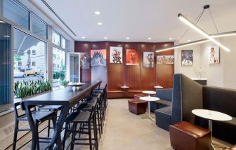 Lobby lounge area and workspace at Nu Hotel - Brooklyn.