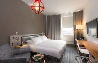 Standard room with king bed and work desk at Nu Hotel - Brooklyn.