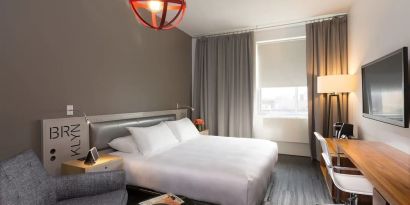Standard room with king bed and work desk at Nu Hotel - Brooklyn.