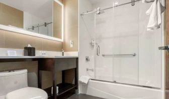 Private guest bathroom with free toiletries at Comfort Inn Prospect Park-Brooklyn.