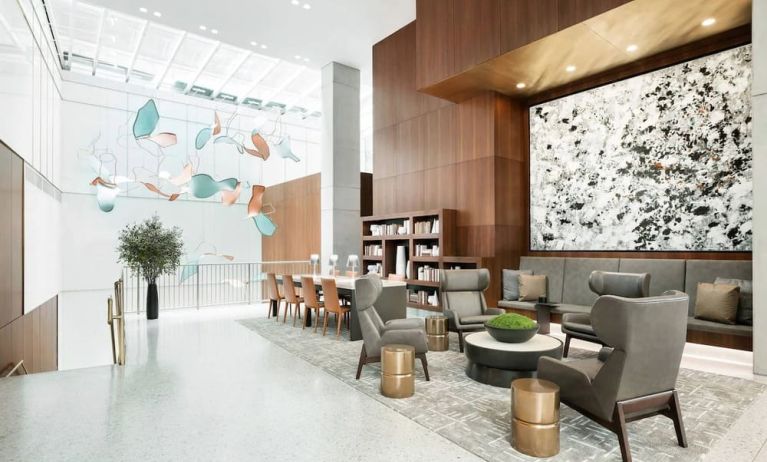 Lobby workspace and lounge area at AC Hotel New York Times Square.