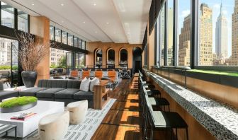 Lounge area with comfortable seating, perfect for coworking at AC Hotel New York Times Square.