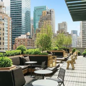 Beautiful terrace with comfortable seating at AC Hotel New York Times Square.