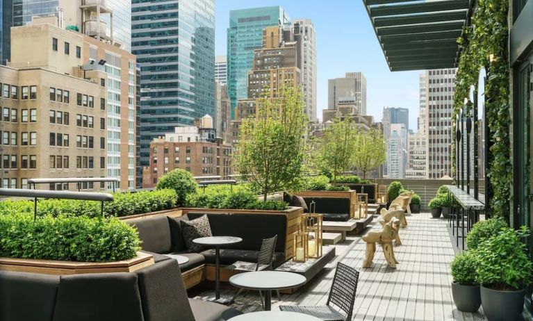 Beautiful terrace with comfortable seating at AC Hotel New York Times Square.