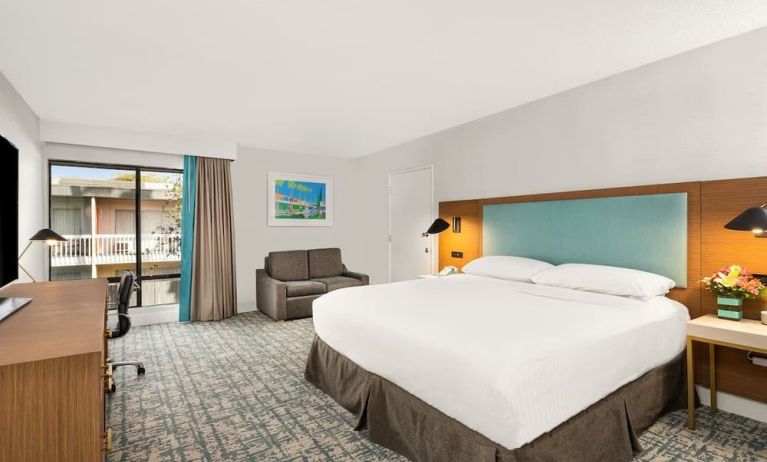 Day use room with work desk and natural light at The Anaheim Hotel.
