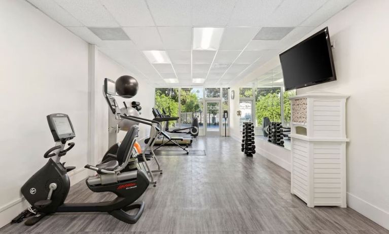 Fitness center with natural light at The Anaheim Hotel.