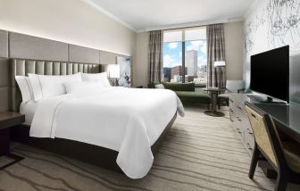 Delux king room with TV and a great view of the city at The Westin New Orleans.