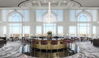 Hotel bar and lounge area with natural light at The Westin New Orleans.