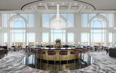 Hotel bar and lounge area with natural light at The Westin New Orleans.