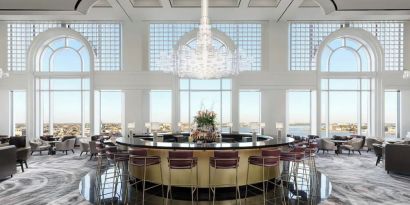 Hotel bar and lounge area with natural light at The Westin New Orleans.