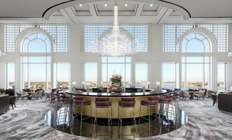 Hotel bar and lounge area with natural light at The Westin New Orleans.