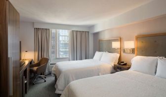 Day use twin room with work desk, large windows and private bathroom at Hampton Inn Manhattan Chelsea.