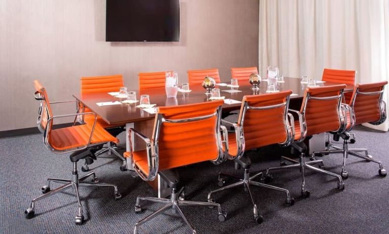 Professional meeting room with comfortable seating at Courtyard By Marriott New York Manhattan/Central Park.