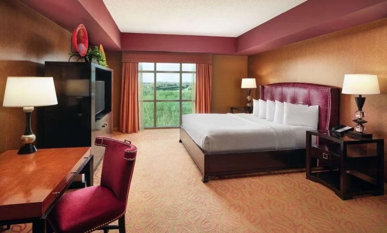Day use room with work desk and natural light at Embassy Suites By Hilton Charlotte-Concord-Golf Resort & Spa.