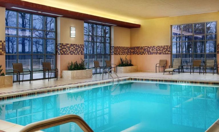 Beautiful indoor pool at Embassy Suites By Hilton Charlotte-Concord-Golf Resort & Spa.