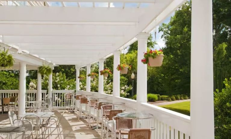 Alfresco dining in the patio of Embassy Suites By Hilton Charlotte-Concord-Golf Resort & Spa.