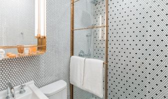 Private guest bathroom with shower at Hotel Shocard NYC.