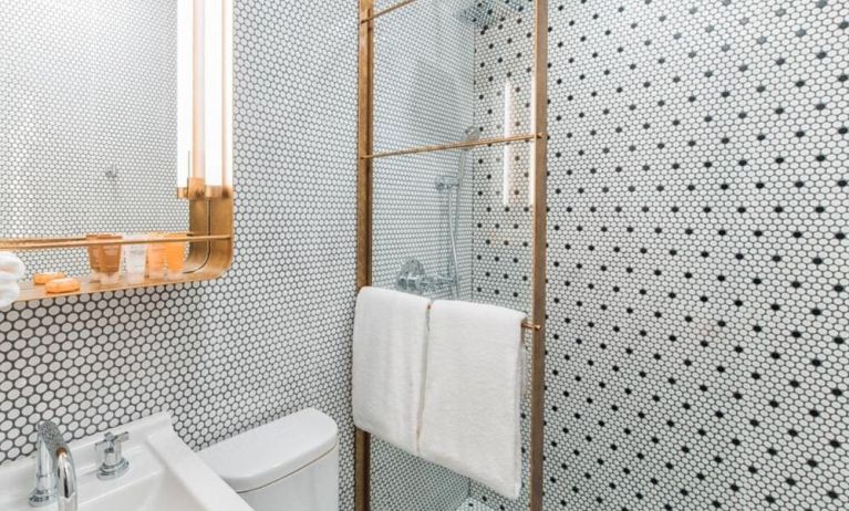 Private guest bathroom with shower at Hotel Shocard NYC.