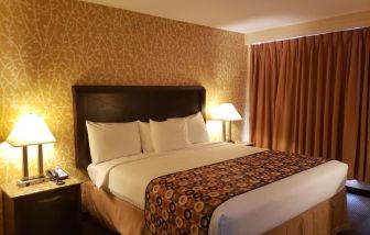 King bed at Elmhurst Hotel.