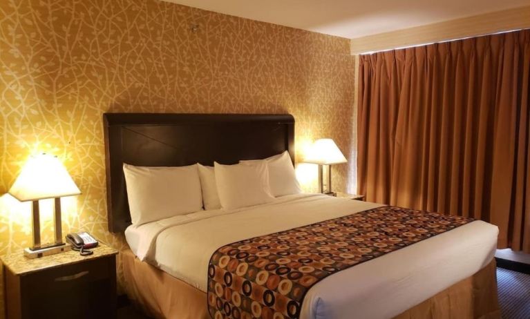 King bed at Elmhurst Hotel.