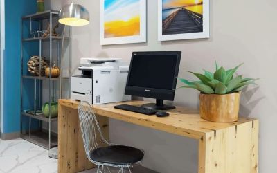 Business center with computer and printer at Days Inn By Wyndham Staten Island.