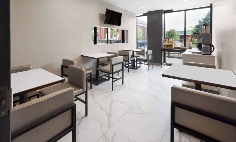 Dining area with comfortable seating, perfect for co-working at Days Inn By Wyndham Staten Island.