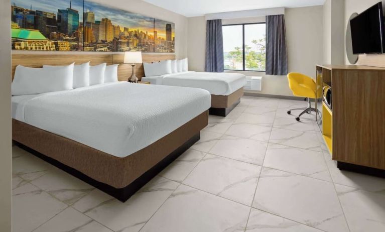 Day use twin room with work desk and private bathroom at Days Inn By Wyndham Staten Island.