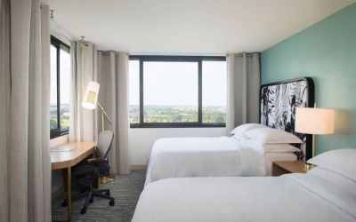 Day use twin room with work desk and private bathroom at Sheraton Miami Airport Hotel.
