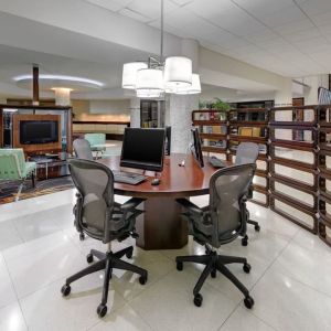 Business center with computers, printer and ergonomic chairs at Sheraton Miami Airport Hotel.