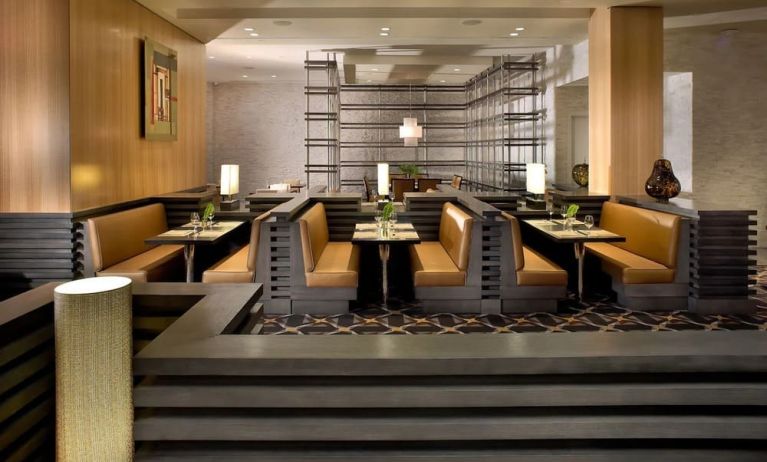 Dining area with comfortable seating, perfect for co-working at EB Hotel Miami.