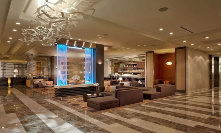 Hotel lobby with lounge seating at EB Hotel Miami. 