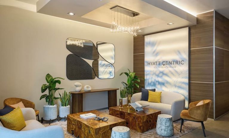 Reception with lounge seating, perfect for co-working at Hyatt Centric Miami South Beach.