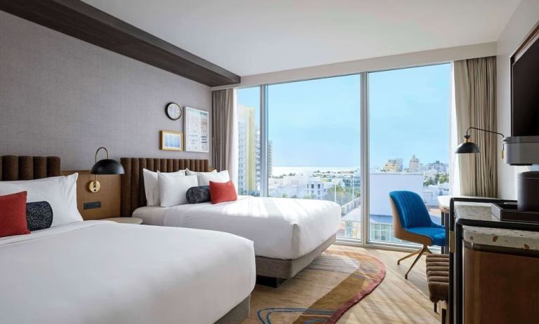 Day use twin room with floor to ceiling windows, work desk and private bathroom at Hyatt Centric Miami South Beach.