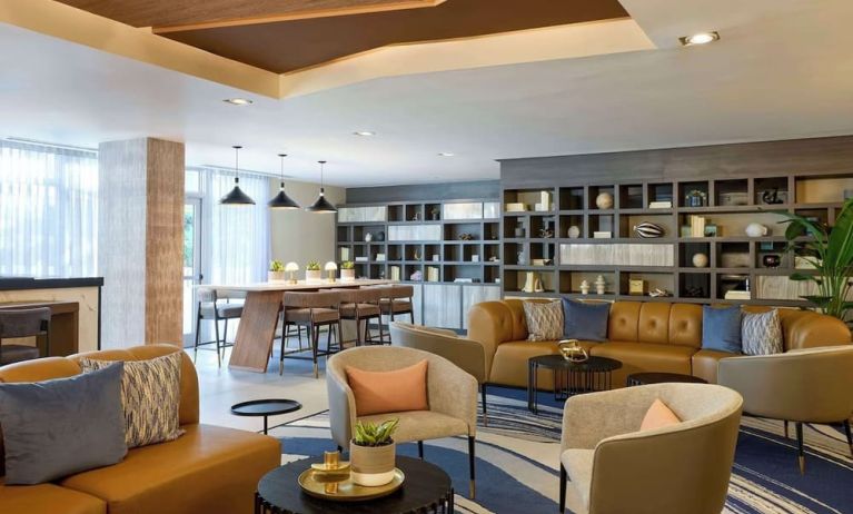 Lounge area and workspace with comfortable seating, perfect for co-working at Hyatt Centric Miami South Beach.