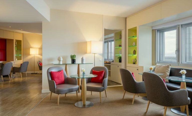 Lobby seating at Sheraton Paris Charles De Gaulle Airport Hotel.