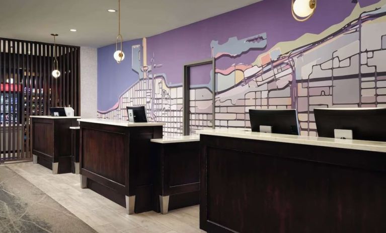 Reception desk at Homewood Suites By Hilton Chicago Downtown/Magnificent Mile.