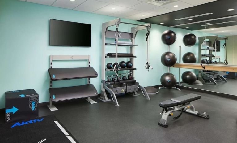 Fitness center at Tru By Hilton Atlanta Northlake Parkway.