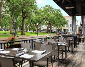 Outdoor restaurant at Hilton Garden Inn Mobile Downtown.