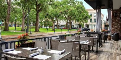 Outdoor restaurant at Hilton Garden Inn Mobile Downtown.
