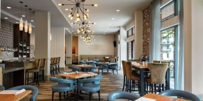 Dining area at Hilton Garden Inn Mobile Downtown.