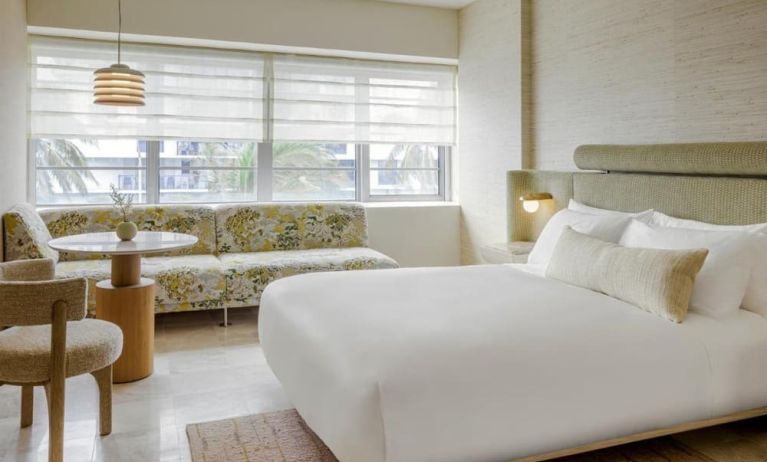 Day use room with lounge and workspace area and private bathroom at Shelborne South Beach.