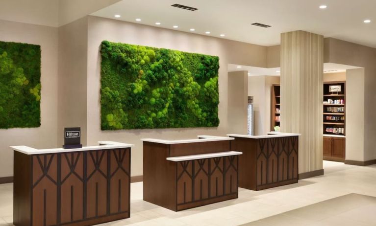 Reception desk at Embassy Suites By Hilton Oahu Kapolei.