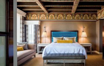 Day use room with sofa and natural light at Courtyard San Diego Downtown.